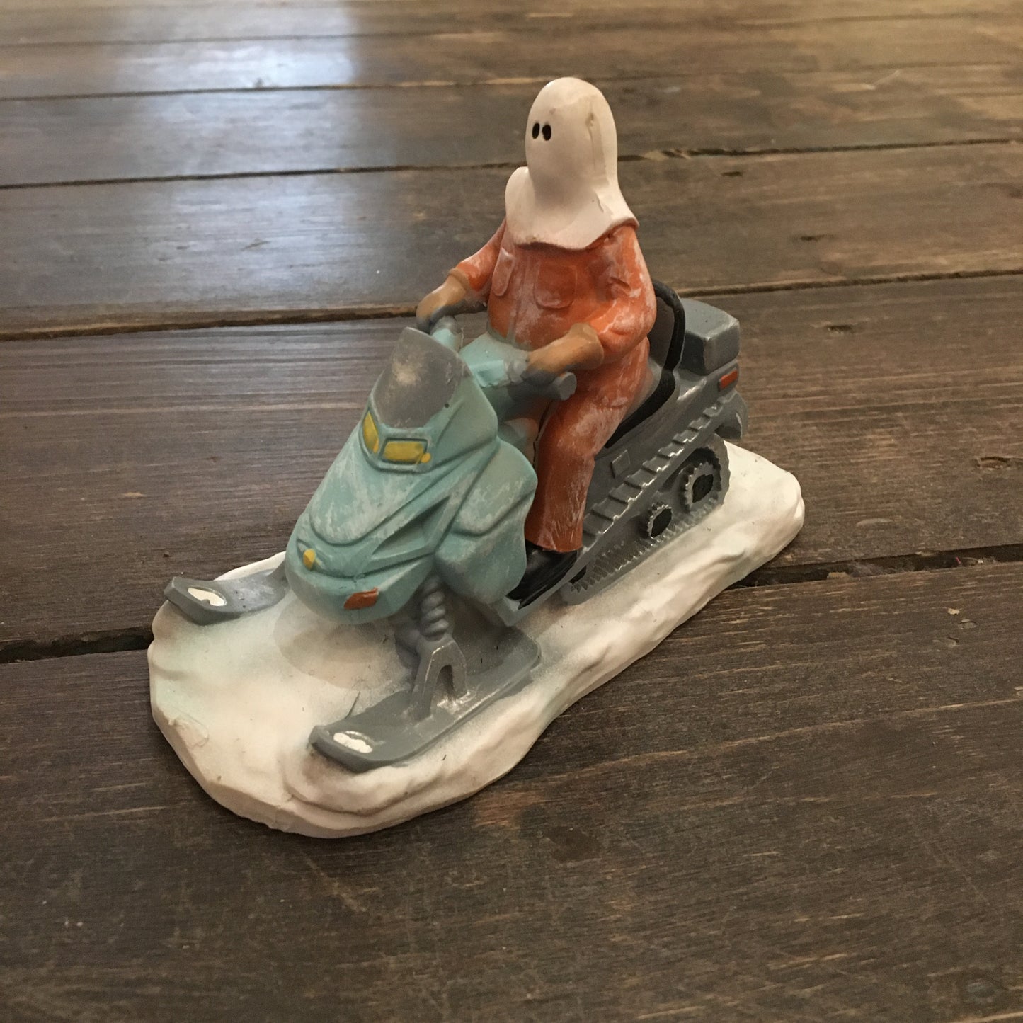 Mummer on Skidoo Figurine