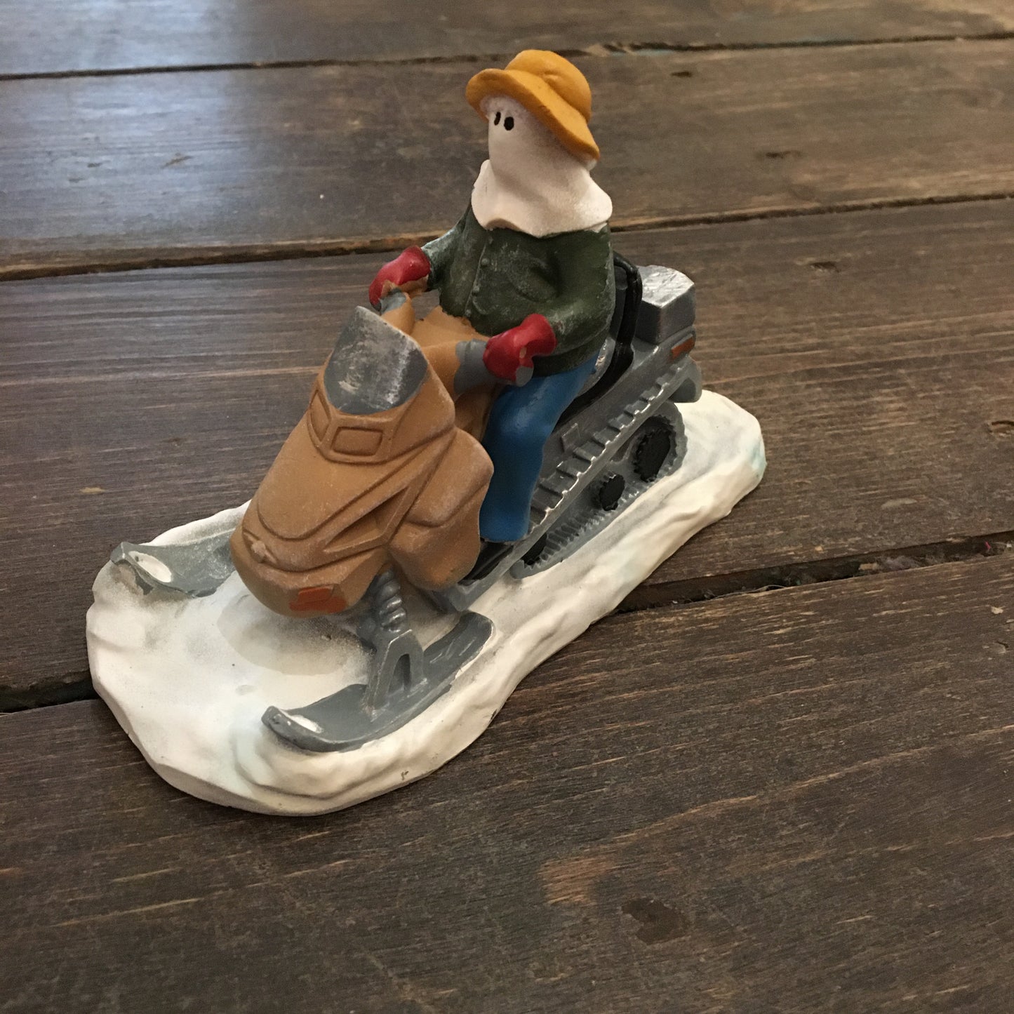 Mummer on Skidoo Figurine